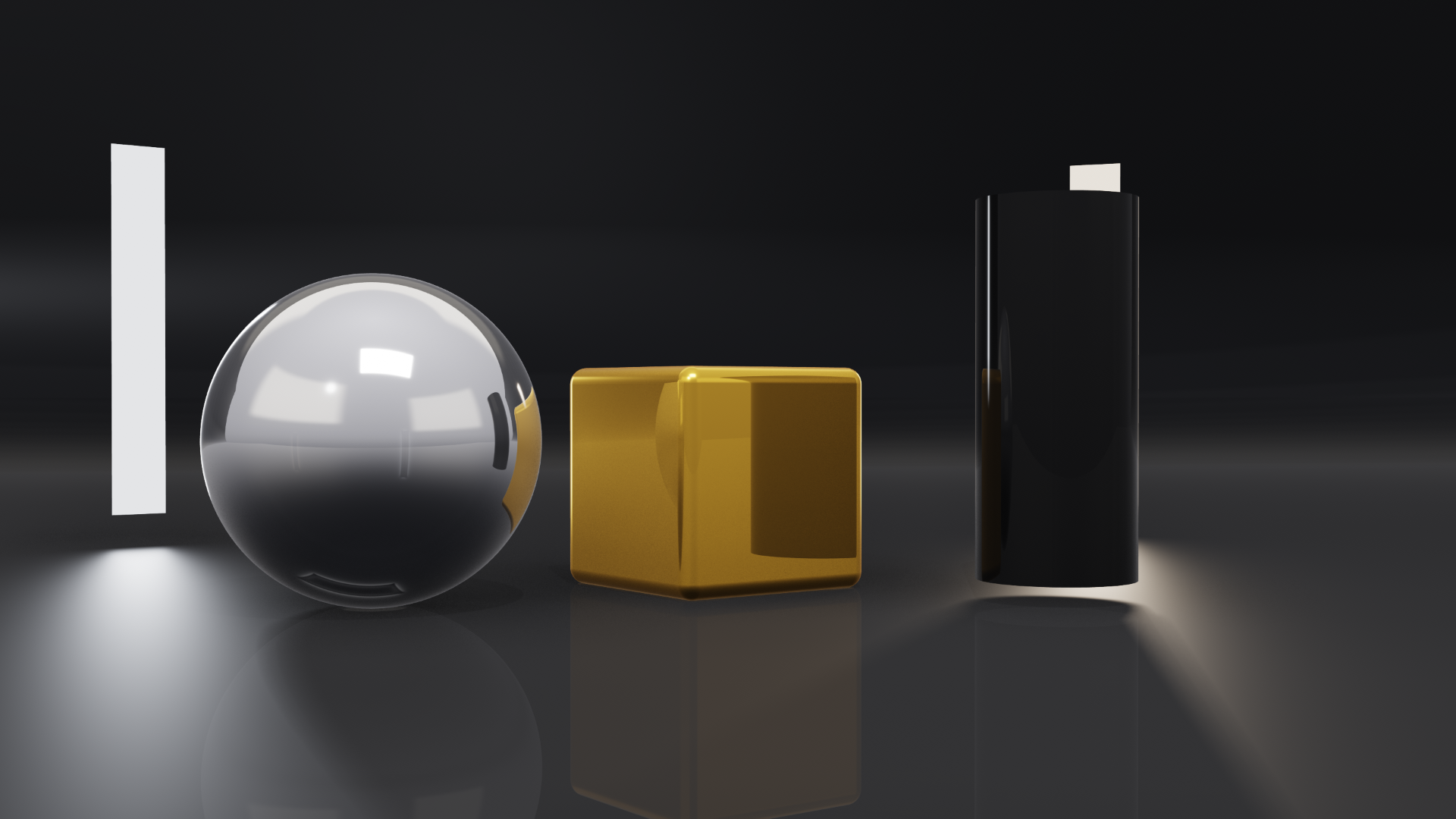 A studio set with no finish: a chrome ball, a gold box and a black cylinder on a grey floor