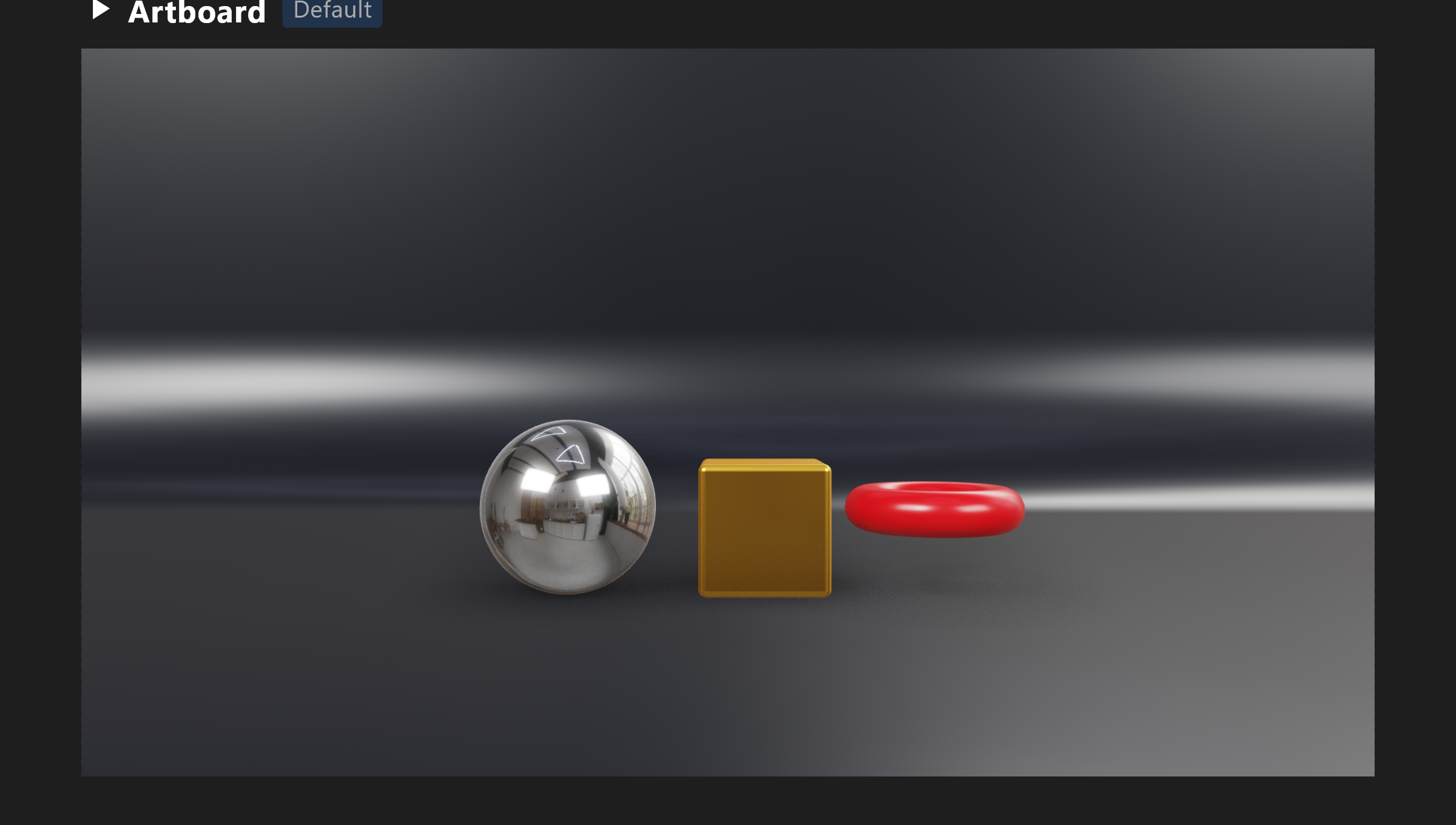 A small product set on the stage: a chrome ball, a gold box and a red torus on a dark sweep, lit by a sky and two softboxes